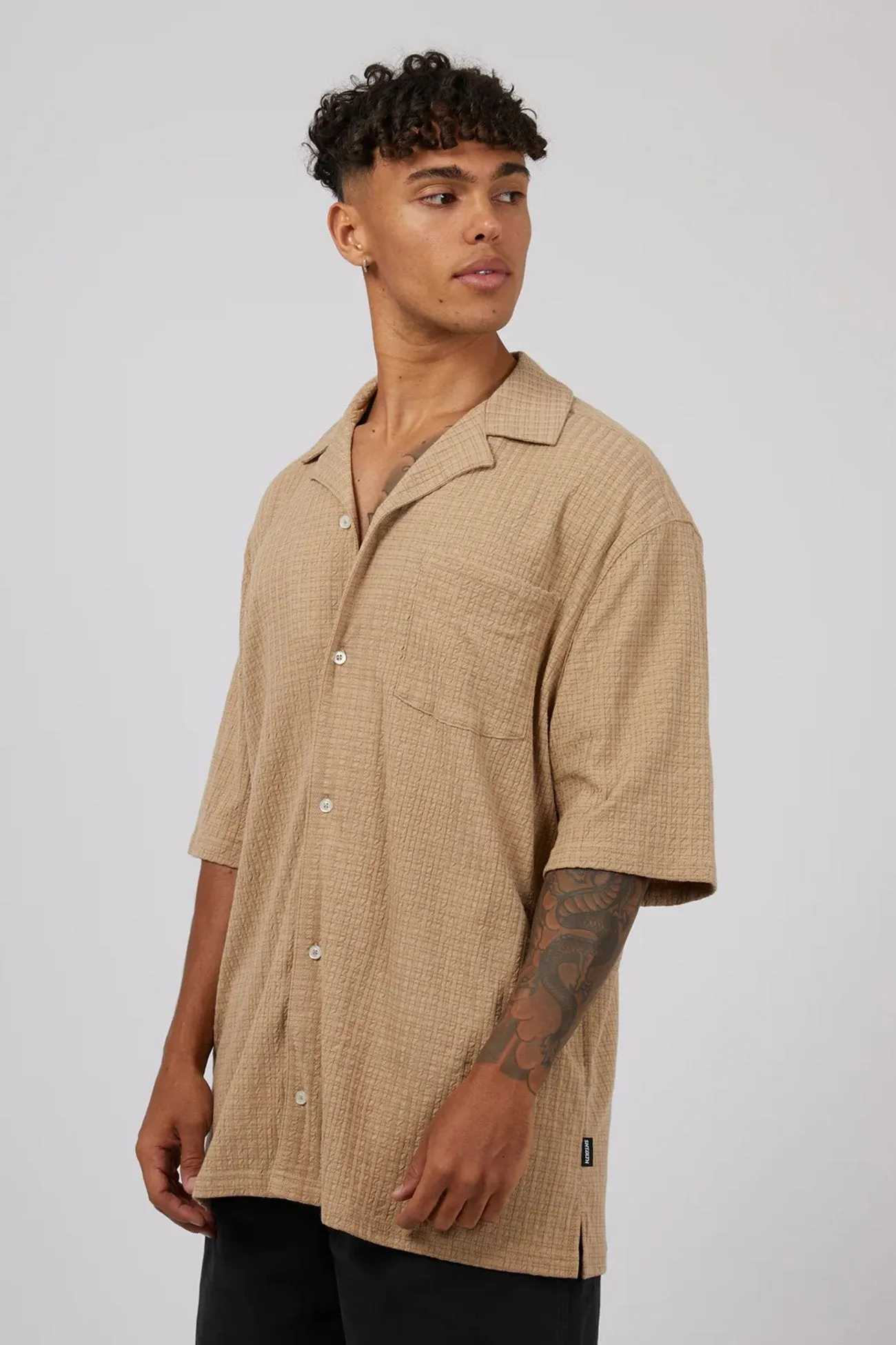 Otta Short Sleeve Shirt Tan Curved Hemline Adult Wear